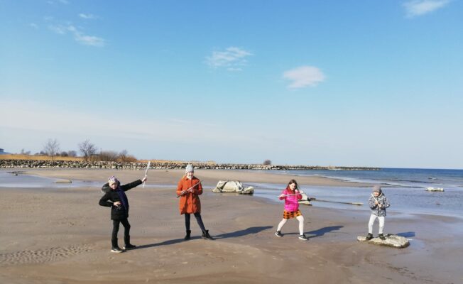 Flautisti Rojas pludmalē